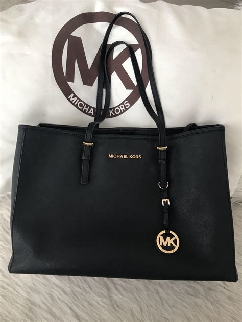 tas michael kors original|michael kors bag black.